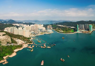 High angle view of boats in city