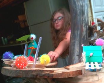 Portrait of happy girl and woman on table