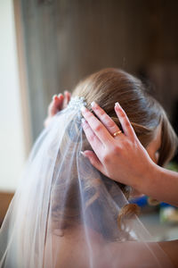 Close-up of bride wearing veil