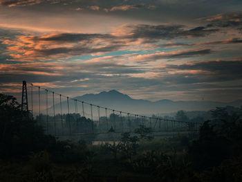 Scenic view of mountains against sky during sunset