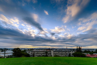 Scenic view of field against sky during sunset