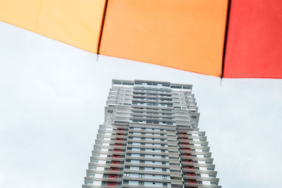 Low angle view of modern building against sky