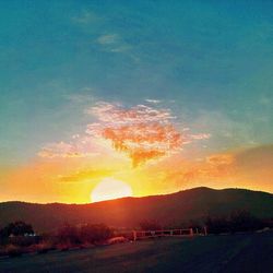 Scenic view of mountains at sunset