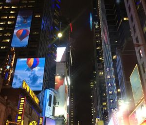 Low angle view of illuminated building at night