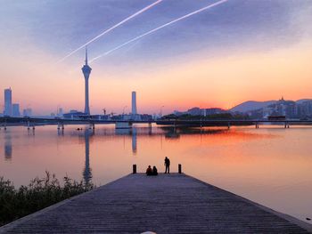 Silhouette of city at sunset