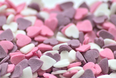 Delicious pink valentines day sugar hearts and ornaments in pink, purple and white show i love you