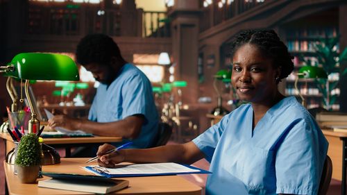 Side view of woman using mobile phone at restaurant