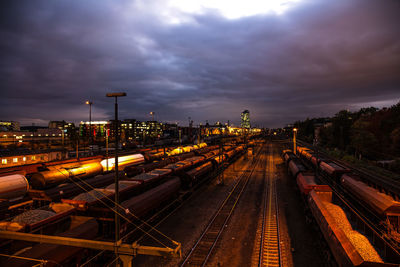 High angle view of train against sky at dusk
