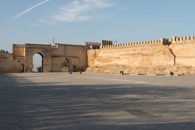 Low angle view of old ruins against sky