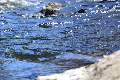 Close-up of water splashing in sea