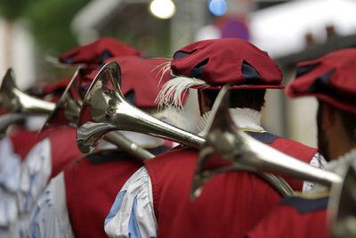 Musicians playing wind instrument during parade