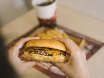 Close-up of hand holding food