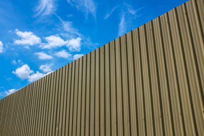 Low angle view of building against blue sky