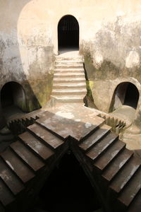 Narrow stairs leading to old building