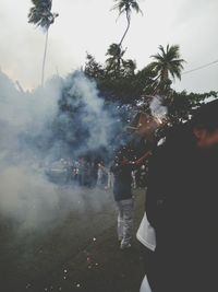 People in park against sky