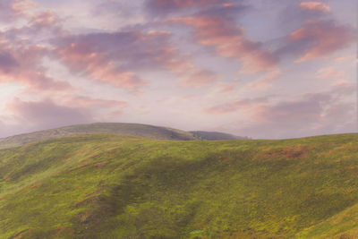 Scenic view of mountains against sky during sunset