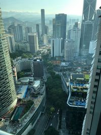 High angle view of buildings in city against sky