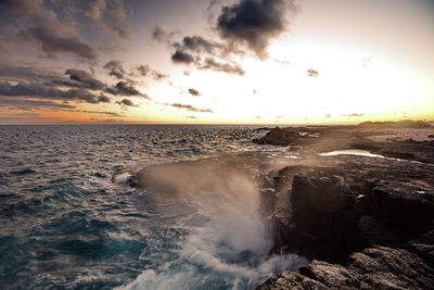 Scenic view of sea against sky during sunset