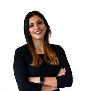 Portrait of a smiling young woman over white background