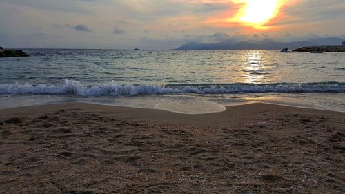 Scenic view of sea against sky during sunset