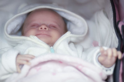 Cute baby sleeping in bed