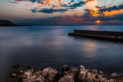 Scenic view of sea against sky during sunset