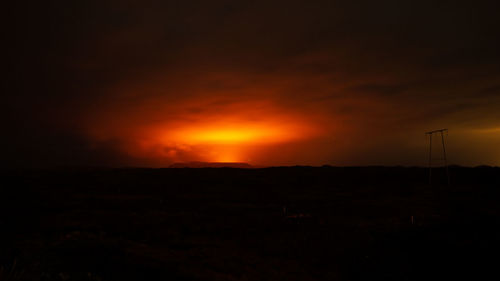 Scenic view of dramatic sky during sunset