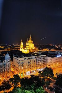 Illuminated buildings in city at night