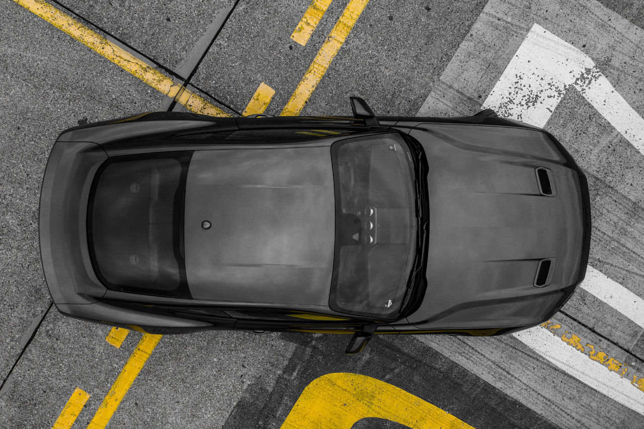 HIGH ANGLE VIEW OF CAR ON ROAD