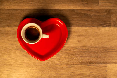 Directly above shot of coffee cup on table