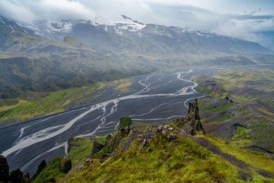 Dramatic clouds coming to the valley of thorsmork, southern iceland. view from valahnukur hill. 