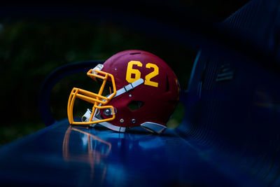 High angle view of illuminated football helmet