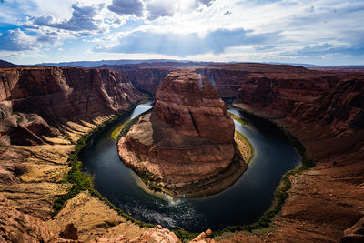 Panoramic view of rock formations against sky