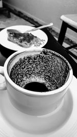 High angle view of coffee cup on table