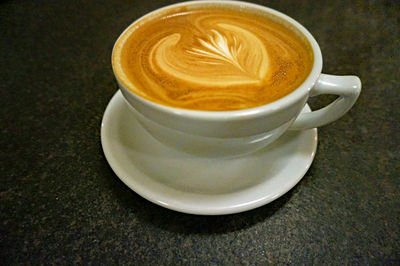 High angle view of cappuccino on table