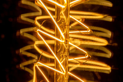 Edison light bulb filament macro. abstract light background