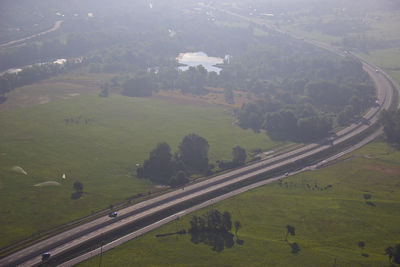 High angle view of road amidst field