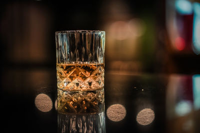 Close-up of wine glass on table