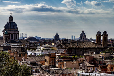 High angle view of buildings in city against sky