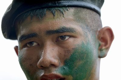 Close-up portrait of mid adult man