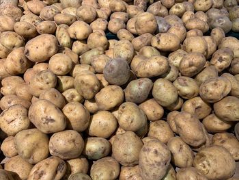 Full frame shot of onions for sale at market stall