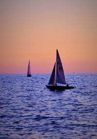 Scenic view of sea at sunset