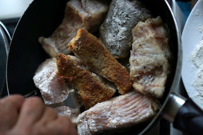 Close-up of person preparing food