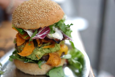 Close-up of burger in plate on table