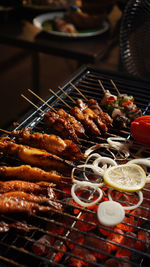 Close-up of seafood on barbecue grill