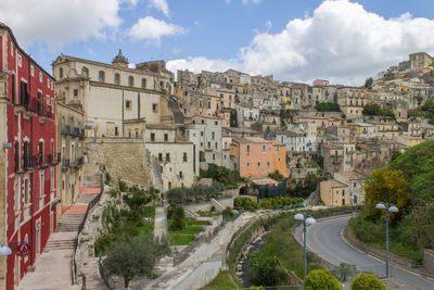 High angle view of street amidst buildings in city, ragusa ibla