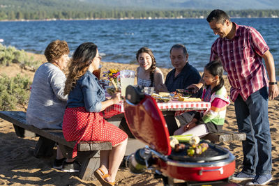 Group of people on barbecue grill