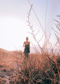 Man sitting on field
