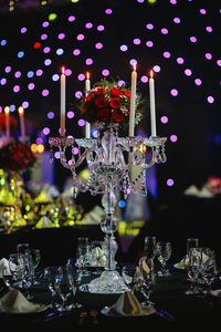 Close-up of illuminated christmas decorations on table