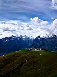 Landscape with mountain range in background